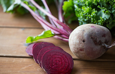 Image showing close up of sliced beet on wood