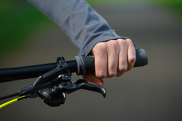 Image showing Woman hands on modern sport bike