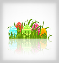 Image showing Easter natural background with traditional colorful eggs in gras