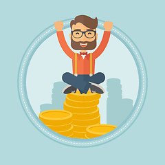 Image showing Happy businessman sitting on coins.