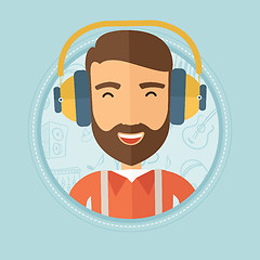 Image showing Man listening to music in headphones.