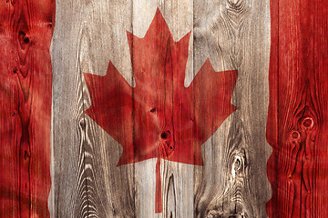 Image showing National flag of Canada, wooden background