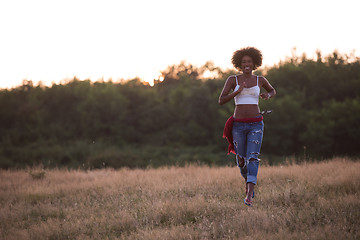 Image showing young black woman in nature