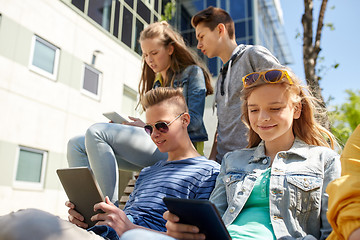 Image showing group of students with tablet pc at school yard