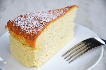 Image showing Yellow cheese cake on table