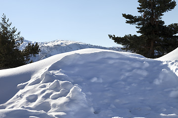 Image showing Snowdrifts in mountain after snowfall at sun winter day