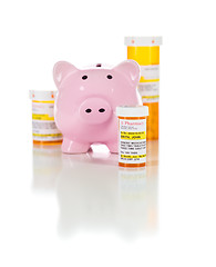 Image showing Piggy Bank and Non-Proprietary Medicine Prescription Bottles Iso