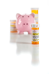Image showing Piggy Bank and Non-Proprietary Medicine Prescription Bottles Iso