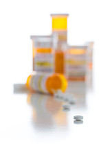 Image showing Non-Proprietary Medicine Prescription Bottles and Spilled Pills 