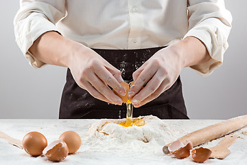 Image showing Hands kneading a dough