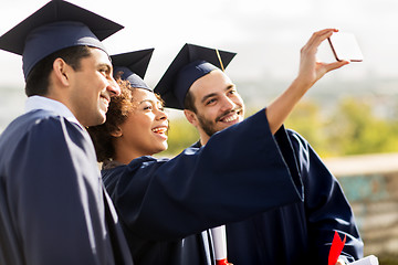 Image showing students or bachelors taking selfie by smartphone