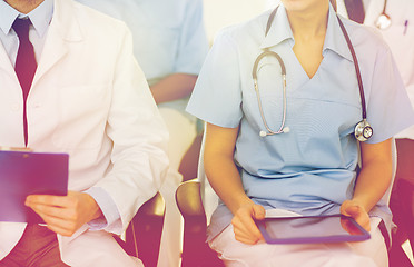 Image showing close up of happy doctors at seminar or hospital