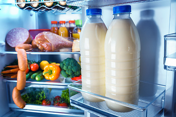 Image showing Open refrigerator filled with food