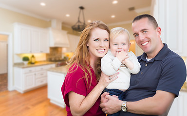 Image showing Young Military Family Inside Their Beautiful Kitchen