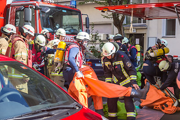 Image showing Firefighters getting ready to intervene on chemical accident location.