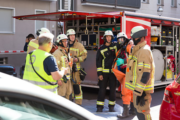 Image showing Firefighters getting ready to intervene on chemical accident location.