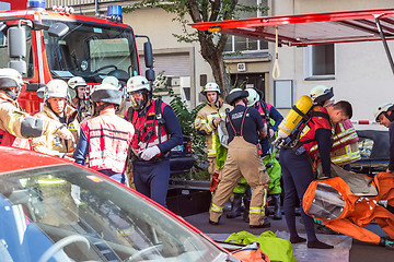 Image showing Firefighters getting ready to intervene on chemical accident location.