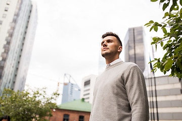 Image showing young man on city street