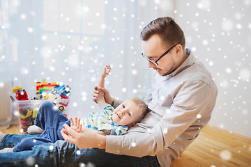 Image showing father with son playing and having fun at home