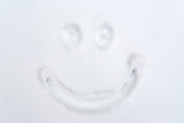 Image showing smiley drawing on snow surface