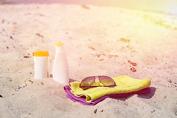 Image showing Beach accessories in the sand