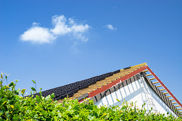 Image showing Roof renovation with black tiles