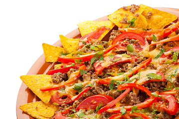 Image showing spicy nachos with pork, tomato and pepper