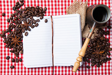 Image showing Blank paper, coffe bean and coffee cup on wood