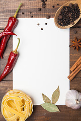 Image showing blank paper with pasta, pepper and spices