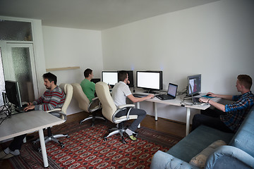 Image showing a group of graphic designers at work