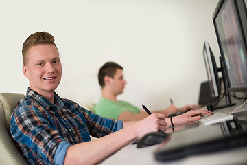 Image showing a group of graphic designers at work