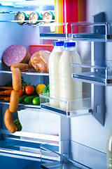 Image showing Open refrigerator filled with food