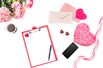 Image showing The gift box with hearts on white background