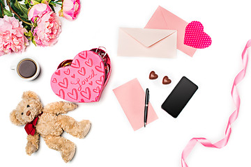 Image showing The gift box with hearts on white background