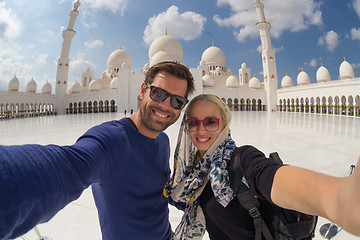Image showing Couple taking selfie in Sheikh Zayed Grand Mosque, Abu Dhabi, United Arab Emirates.