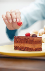 Image showing Woman preparing chocolate cake