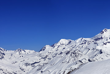 Image showing Panoramic view on off-piste slope and snow mountain at sun winte