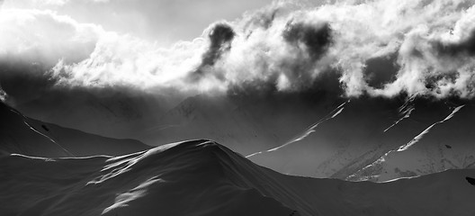 Image showing Black and white on evening mountain and sunlight clouds