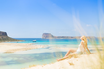 Image showing Relaxed Happy Woman Enjoying Sun on Vacations.