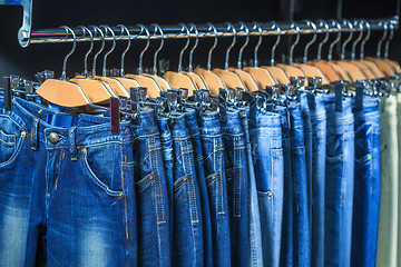 Image showing blue jeans in a shop