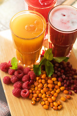 Image showing fruit drink with cranberries raspberries and sea buckthorn