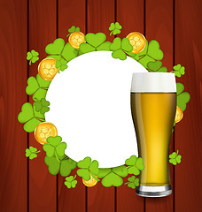 Image showing Greeting card with glass of light beer, shamrocks and golden coi