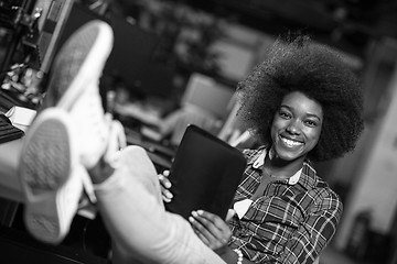 Image showing portrait of a young successful African-American woman in modern 