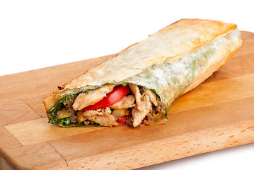 Image showing chicken burrito with fried potato and tomato