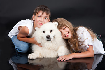 Image showing Girl, Boy And Dog