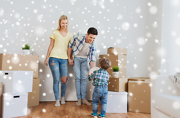 Image showing happy family moving to new home and playing ball