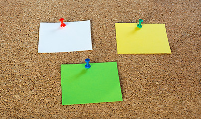 Image showing Thumbtack pins and notepaper on pinboard