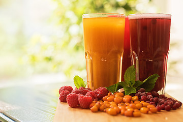 Image showing fruit drink with cranberries raspberries and sea buckthorn