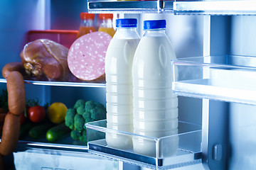 Image showing Open refrigerator filled with food