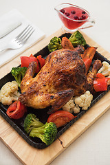 Image showing Roasted chicken with vegetables.